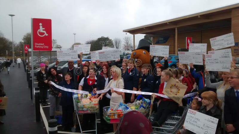 The New Tesco Store in Little Lever is Opened by the Store Manager  Editorial Photo - Image of cheques, holding: 46234116