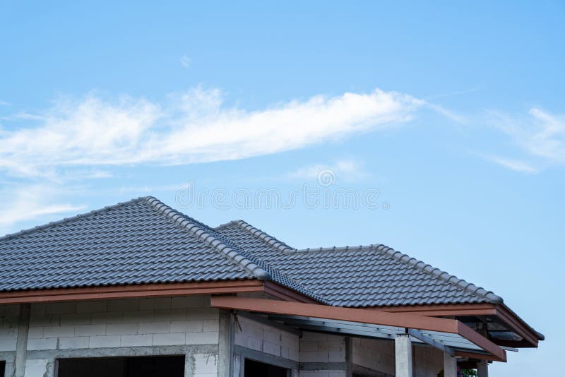 New Tile Roof of Home with Spanish Tiled Roof at Unfinished House