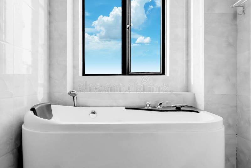 The new toilet and bathtub stock photo. Image of faucet 71436584