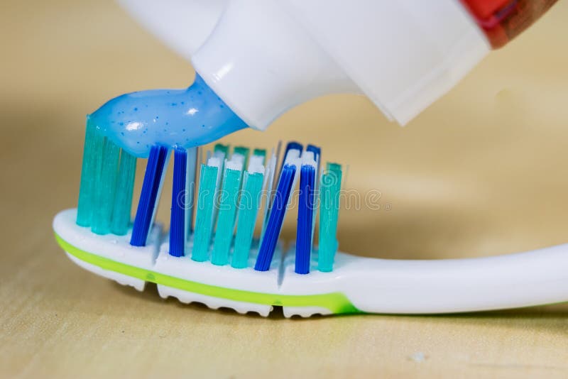 A New Toothbrush. Toothpaste Arranged on the Bristles of a Tooth Stock
