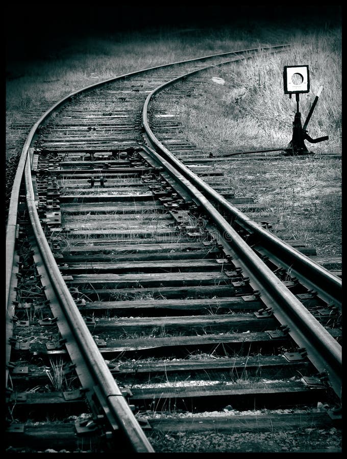 New turn of a railroad tracks, expression of grief and uncertainty in the future connected with fear before everyday changes
