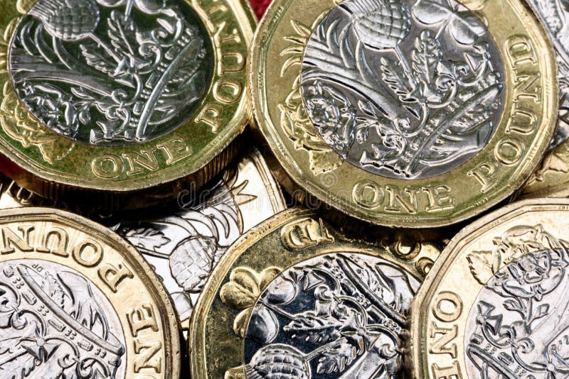 New UK One Pound Coin Currency royalty free stock photo New UK One Pound Coin Currency royalty free stock photo