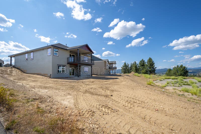 New upscale hillside homes under construction in an American subdivision in Spokane, Washington, USA royalty free stock image New upscale hillside homes under construction in an American subdivision in Spokane, Washington, USA royalty free stock image