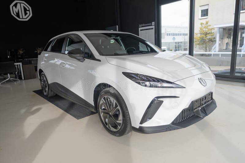 New white Car MG4 Electric, Motor UK Limited Nanjing, high-performance Automobile in showroom, sustainable development EV, Innovation automotive industry show in Wiesbaden, Germany - January 25, 2024. Development ev stock images, royalty-free photos and pictures