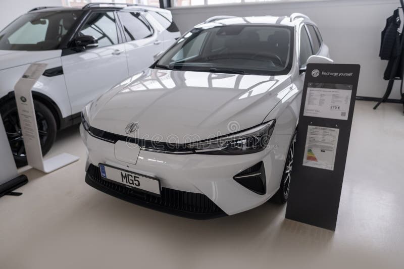 New white Car MG4 Electric, Motor UK Limited Nanjing, high-performance Automobile in showroom, sustainable development EV, Innovation automotive industry show in Wiesbaden, Germany - January 25, 2024. Development ev stock images, royalty-free photos and pictures