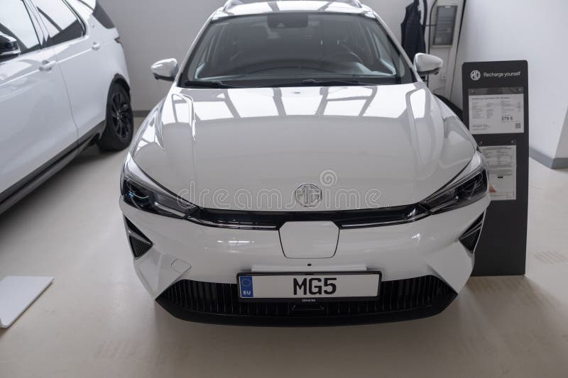 New white Car MG4 Electric, Motor UK Limited Nanjing, high-performance Automobile in showroom, sustainable development EV, Innovation automotive industry show in Wiesbaden, Germany - January 25, 2024. Development ev stock images, royalty-free photos and pictures