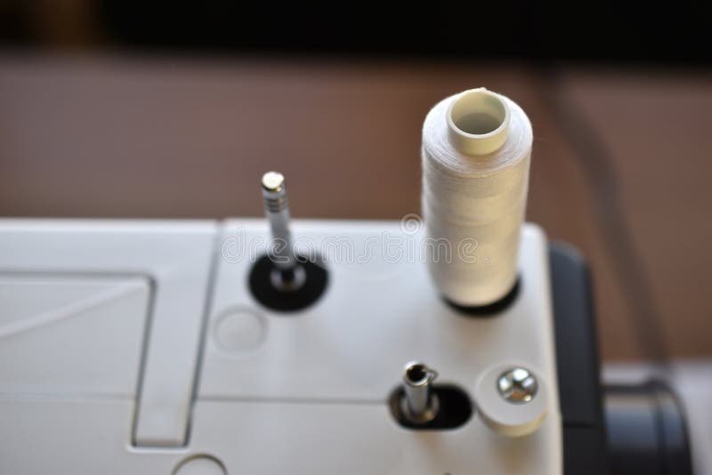 New White Sewing Machine with Threads at Home Stock Photo Image of