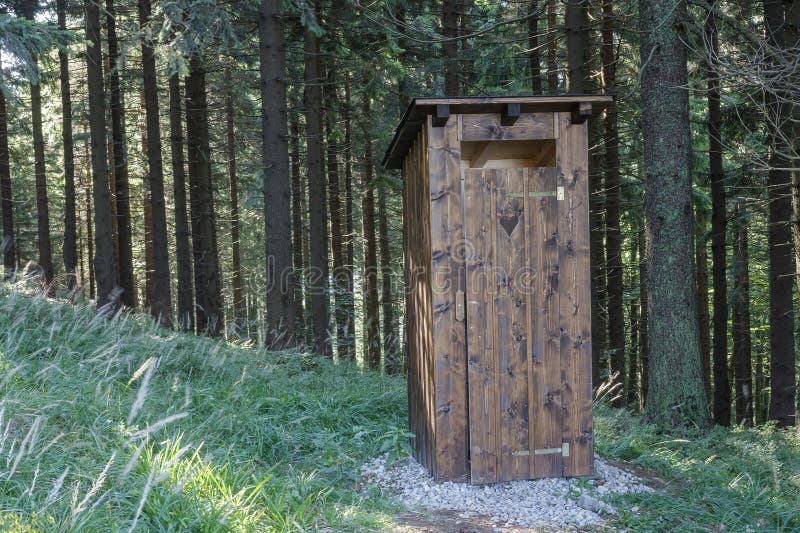New Wooden Outdoor Toilet, Outhouse in Forest in Beskids Mountains ...