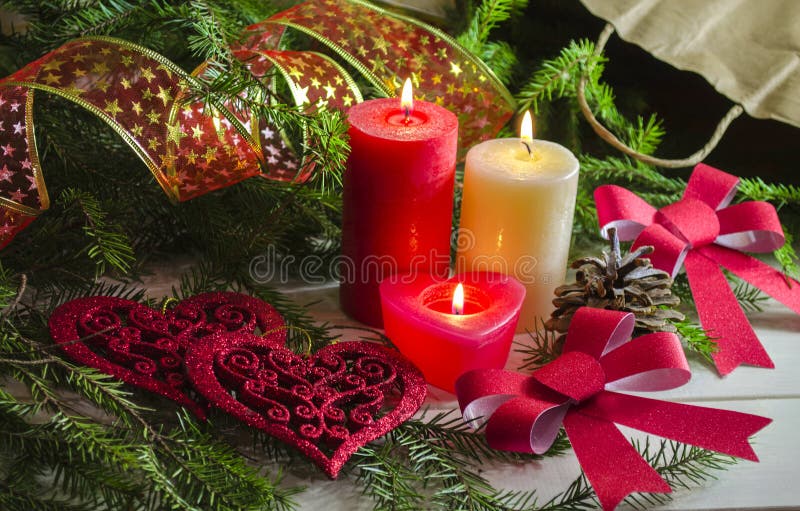 New Year and Christmas background with candles decorated Christmas tree stock images