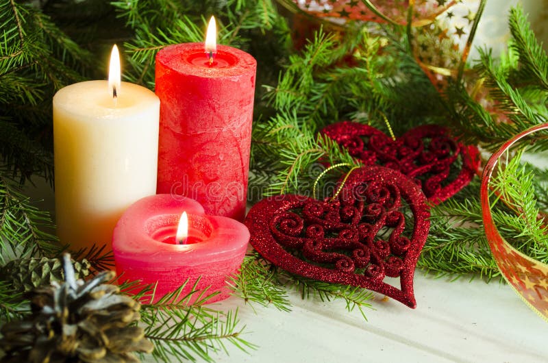 New Year and Christmas background with candles decorated Christmas tree stock photo