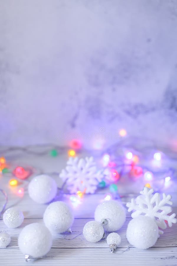 New year or Christmas decorations in silver and white colors with balls, snowflakes and garland bokeh stock photos New year or Christmas decorations in silver and white colors with balls, snowflakes and garland bokeh stock photos