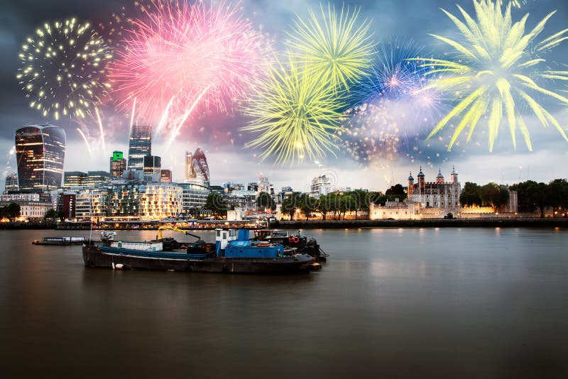 fireworks over the River Thames in London - celebrating New Year in the city