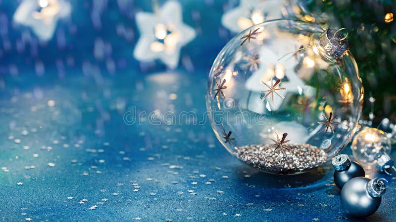 New year decorations. glass christmas tree balls on blurred star lights garland background royalty free stock photos New year decorations. glass christmas tree balls on blurred star lights garland background royalty free stock photos