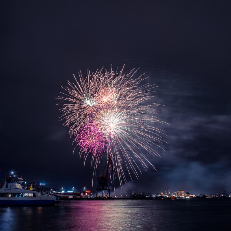 New Year Firework in Gothenburg Sweden with Water Bus in the Foreground