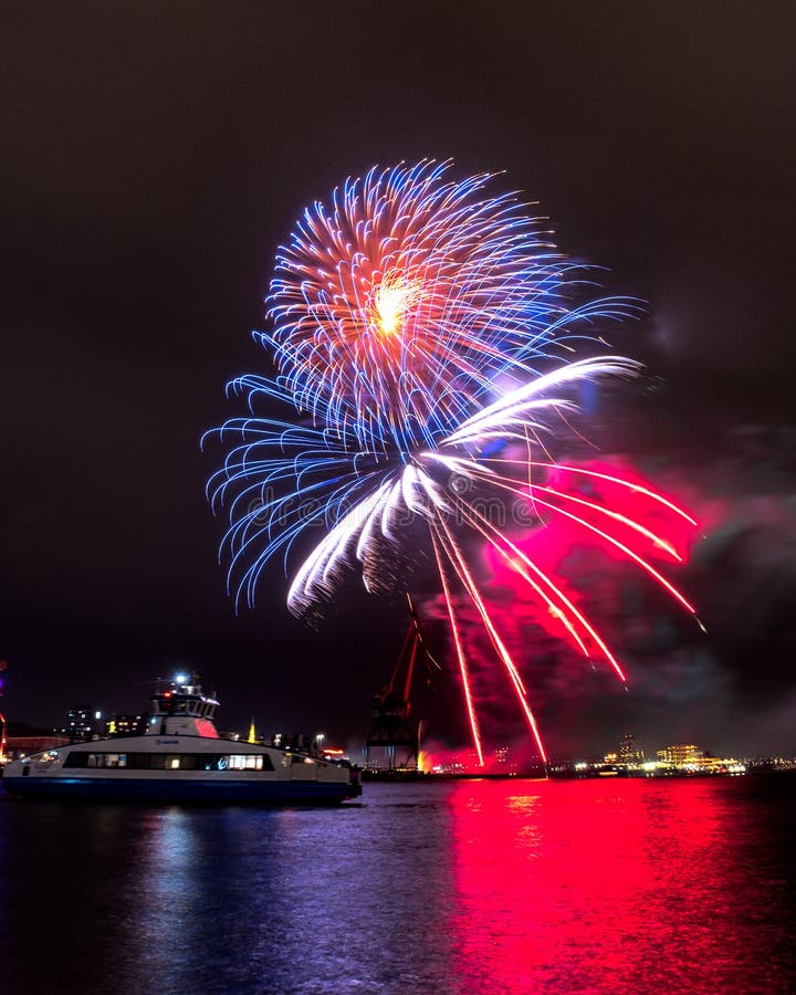 New Year Firework in Gothenburg Sweden with Water Bus in the Foreground