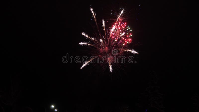 New year`s eve fireworks celebration. shining fireworks with bokeh lights in the night sky. glowing fireworks show. New year`s eve fireworks celebration. shining royalty free stock photography New year`s eve fireworks celebration. shining fireworks with bokeh lights in the night sky. glowing fireworks show. New year`s eve fireworks celebration. shining royalty free stock photography