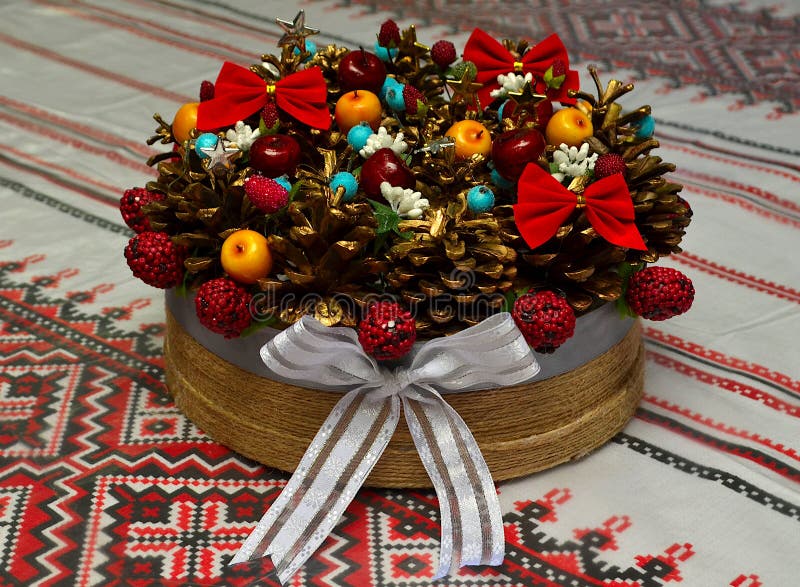 New Year`s, festive still life with cones berries nuts on the table. stock image New Year`s, festive still life with cones berries nuts on the table. stock image