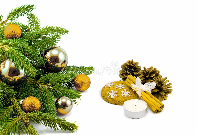 New year theme: Christmas tree, golden balls, decorations, candle, snowflakes, cookies, cones, cinnamon isolated