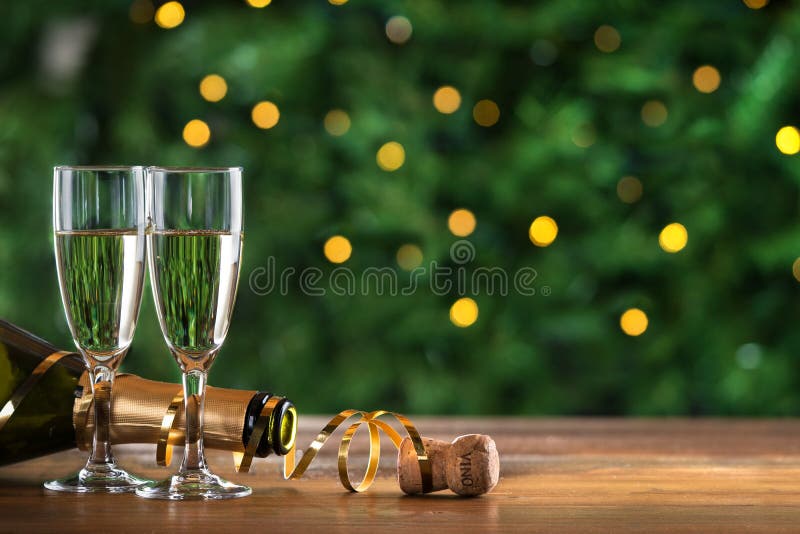 New year , toast champagne, lights background
