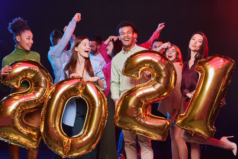 Happy New Year. Group of Young Excited Multiracial Friends Holding ...