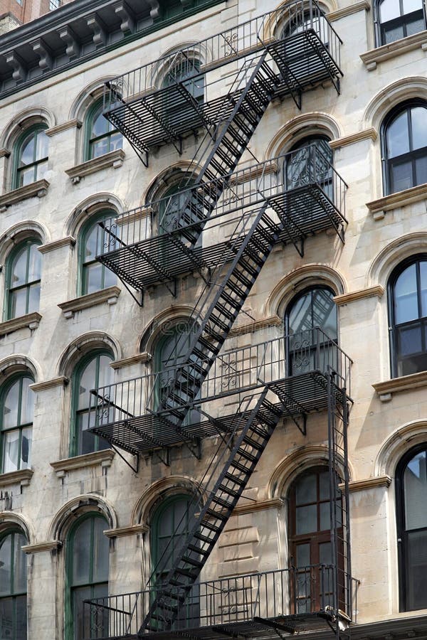 New York Apartment Building with Exterior Fire Escape Ladders Stock Photo -  Image of exterior, external: 189269544