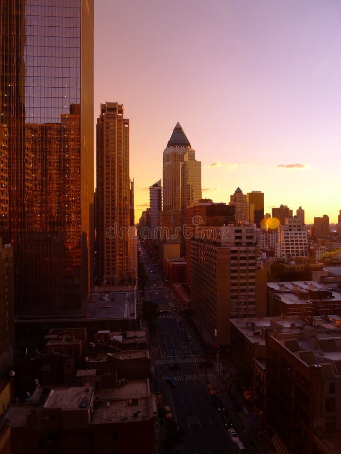 View looking south from the 22nd floor of a 7th avenue building of New York City at sunset. View looking south from the 22nd floor of a 7th avenue building of New York City at sunset