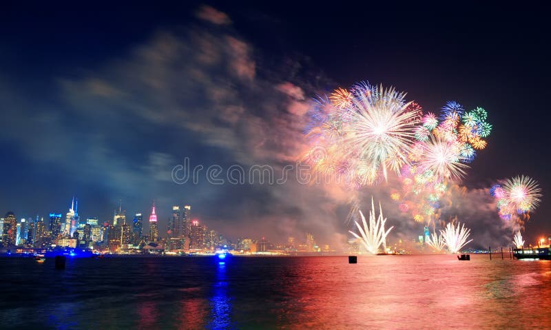 July 4th fireworks show of New York City with Manhattan midtown skyline over Hudson River. July 4th fireworks show of New York City with Manhattan midtown skyline over Hudson River.