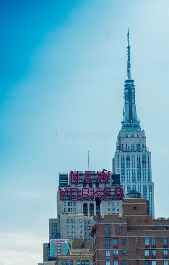 NEW YORK CITY - MAY 23, 2013: The Empire State Building dominates city skyline. It stood as the world\'s tallest building for more than 40 years (from 1931 to 1972. NEW YORK CITY - MAY 23, 2013: The Empire State Building dominates city skyline. It stood as the world\'s tallest building for more than 40 years (from 1931 to 1972