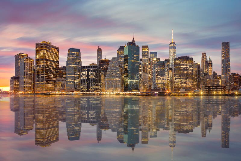 New York City - Manhattan skylines at evening time with reflections, NYC, USA stock photo New York City - Manhattan skylines at evening time with reflections, NYC, USA stock photo