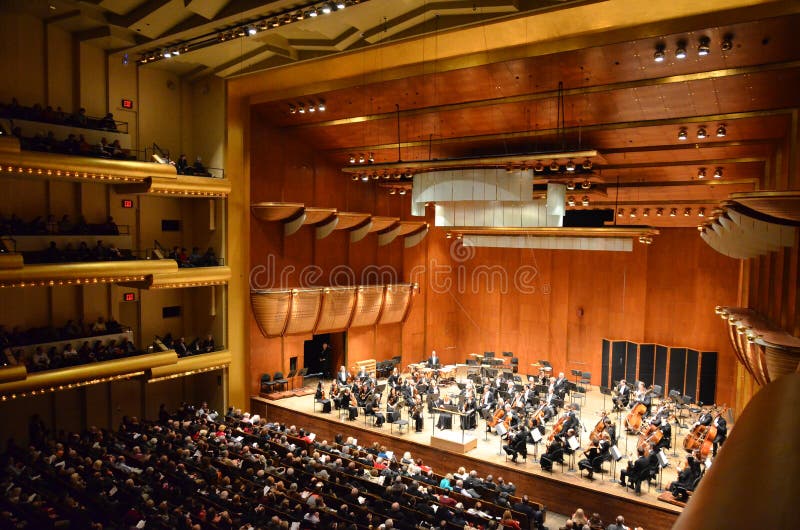 Pictured is the New York Philharmonic in Avery Fisher Hall at Lincoln Center. Lincoln Center for the Performing Arts is in New York City. Avery Fisher Hall is a 2,738-seat symphony hall and is also the home stage of the New York Philharmonic, the oldest symphony in the United States. Pictured is the New York Philharmonic in Avery Fisher Hall at Lincoln Center. Lincoln Center for the Performing Arts is in New York City. Avery Fisher Hall is a 2,738-seat symphony hall and is also the home stage of the New York Philharmonic, the oldest symphony in the United States.