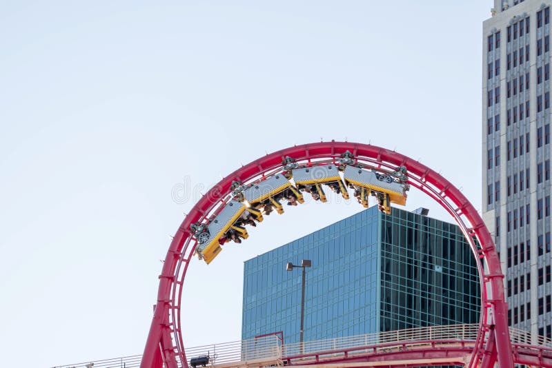 A roller coaster in the middle of a city photo – Free Las vegas strip Image  on Unsplash