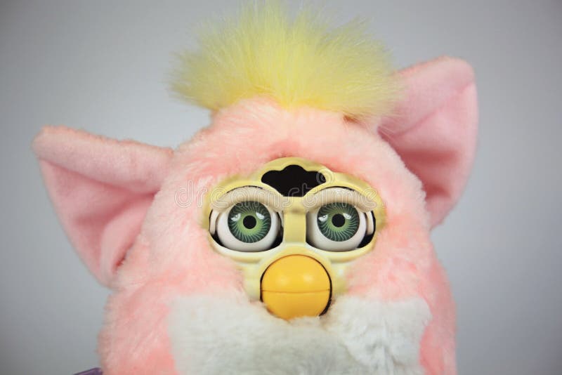 Close-up of original vintage 1990s pink baby Furby talking children`s toy