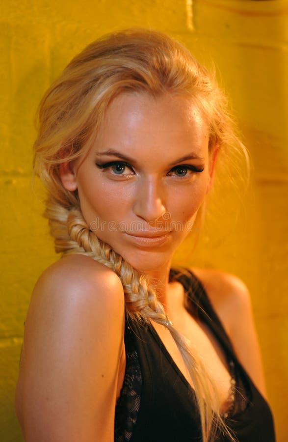 NEW YORK, NY - SEPTEMBER 05: A model gets ready backstage at the DL 1961 Premium Denim spring 2013 fashion show