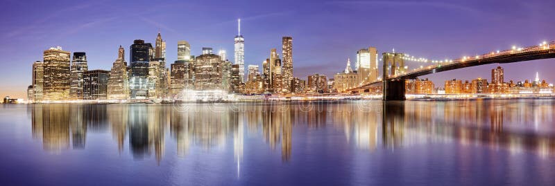 New York panorama with Brooklyn bridge at night, USA