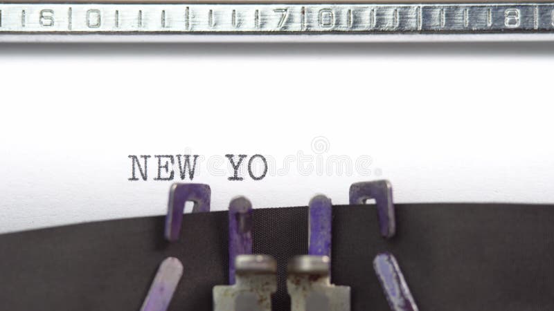 New York phrase closeup being typing and centered on a sheet of paper on old vintage typewriter mechanical