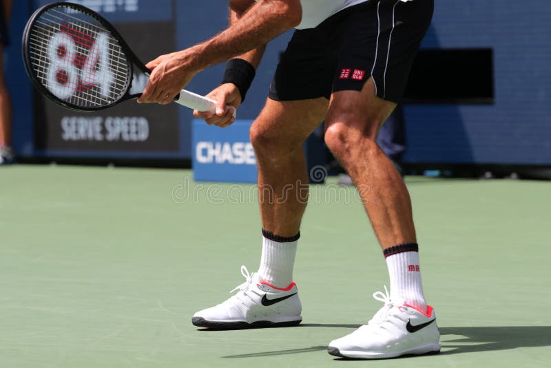 20-time Grand Slam champion Roger Federer of Switzerland wears custom Nike tennis shoes during the 2019 US Open round of 16 match