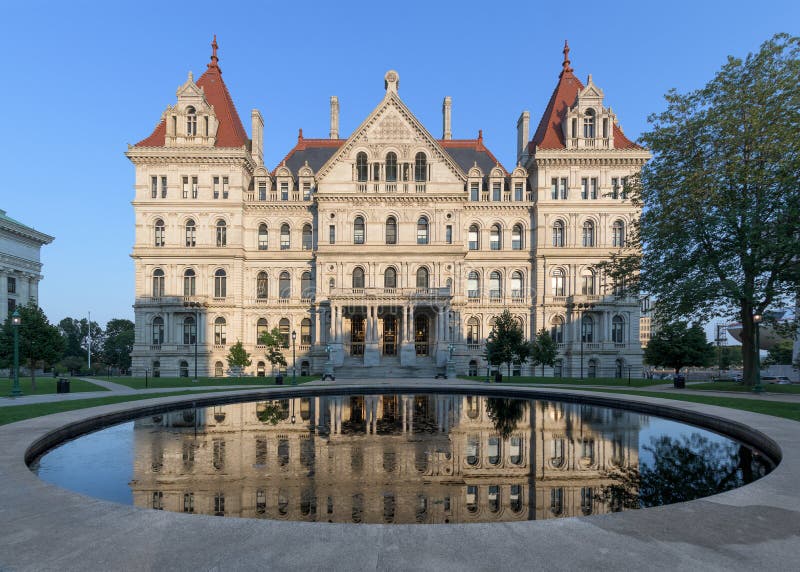 New York State Capitol reflection. New York State Capitol building and its reflection from West Capitol Park in Albany, New York stock photos New York State Capitol reflection. New York State Capitol building and its reflection from West Capitol Park in Albany, New York stock photos