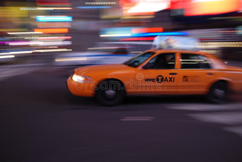 New York taxi driving through Times Square