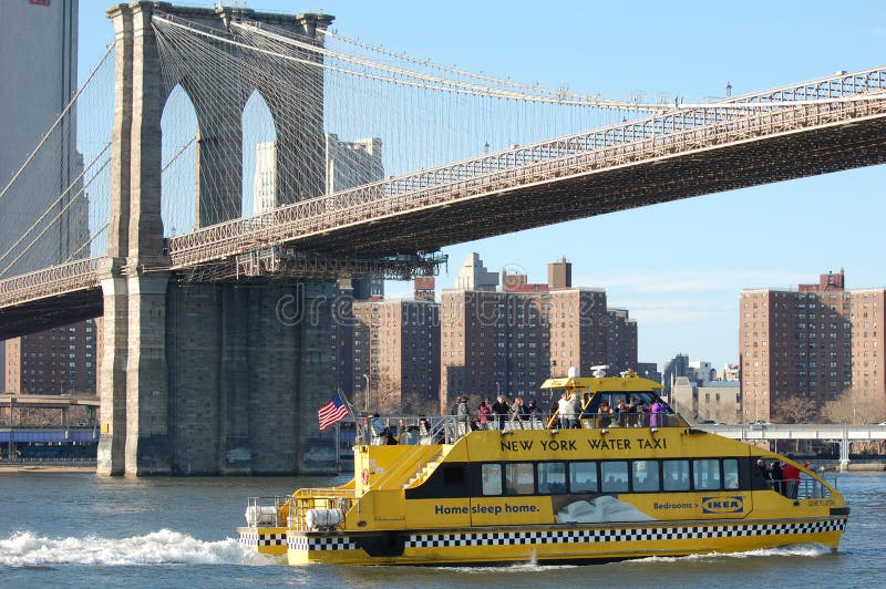 Water Taxi at the Brooklyn Bridge in New York City Editorial Photo