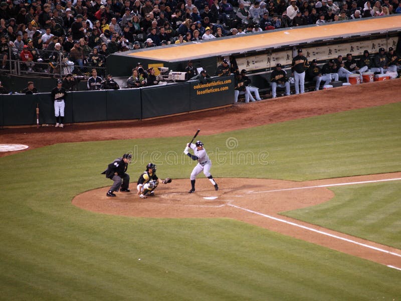 Yankees 6 vs A's 2: New York Yankees Alex Rodriguez stands in the batters box at bat with Kurt Suzuki and Umpire behind him. Taken July 7 2010 at the Coliseum in Oakland California. Yankees 6 vs A's 2: New York Yankees Alex Rodriguez stands in the batters box at bat with Kurt Suzuki and Umpire behind him. Taken July 7 2010 at the Coliseum in Oakland California.