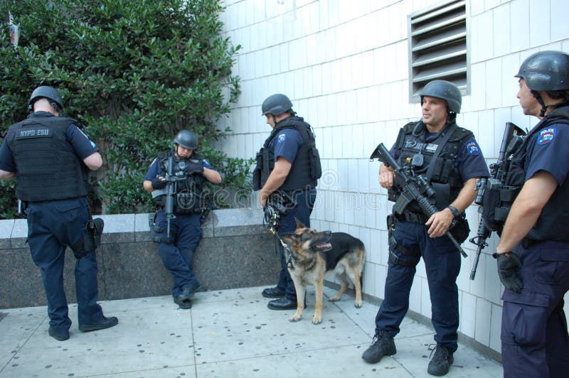 Special response police officers carrying machine guns and other special equipment are prepared to respond to unusual emergencies. Units have become more visible in New York City since the terrorist attack on the World Trade Center in 2001. Special response police officers carrying machine guns and other special equipment are prepared to respond to unusual emergencies. Units have become more visible in New York City since the terrorist attack on the World Trade Center in 2001.