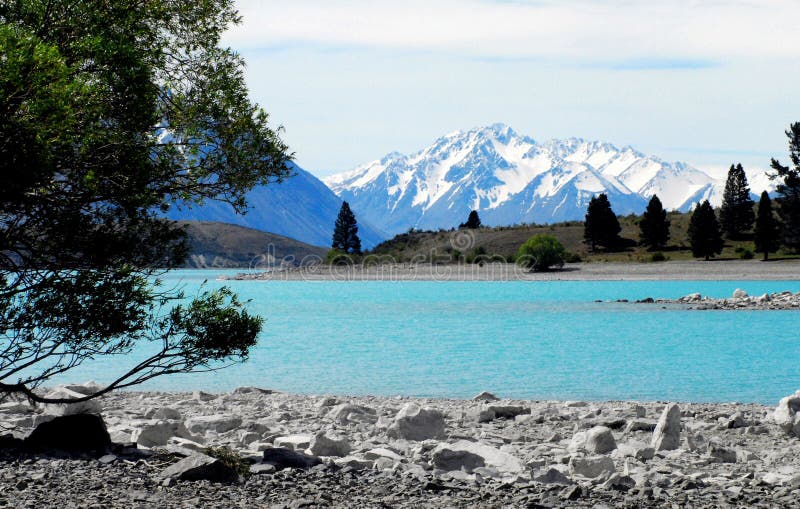 New Zealand- Panorama of Lake Tekapo and Southern Alps royalty free stock photography New Zealand- Panorama of Lake Tekapo and Southern Alps royalty free stock photography