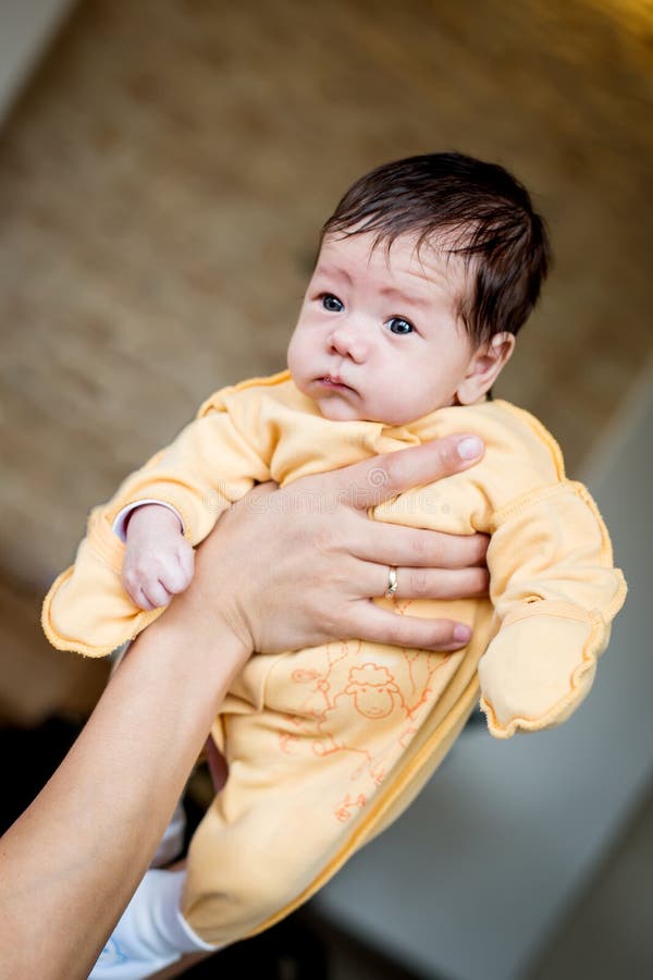 Newborn baby in the arms stock image. Image of beautiful 47704499