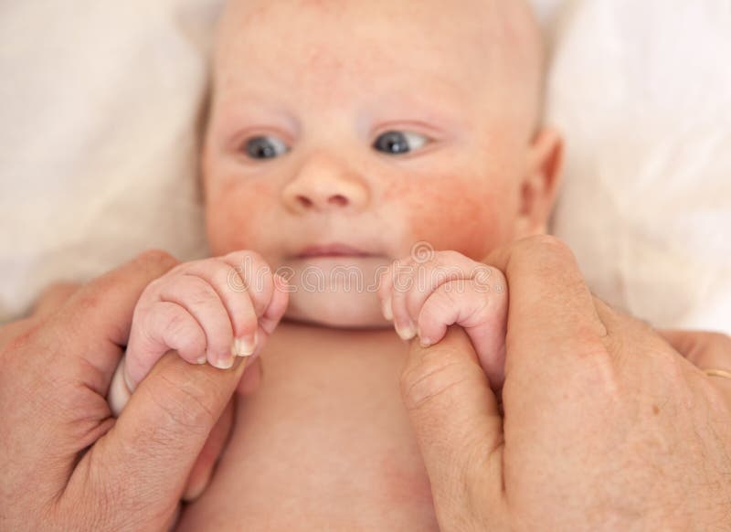 newborn baby boy - in the hands of the father