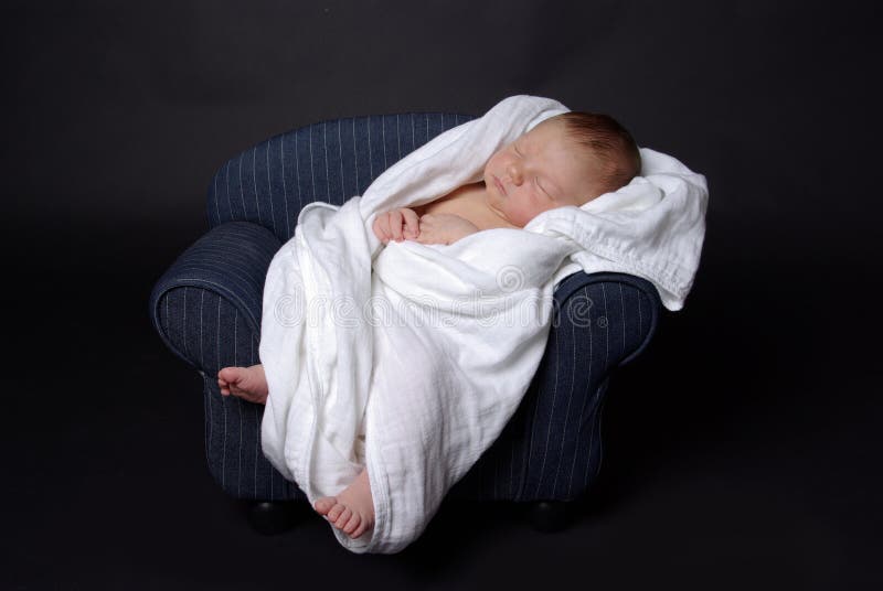 Newborn baby on couch stock photo. Image of baby, couch 6687678