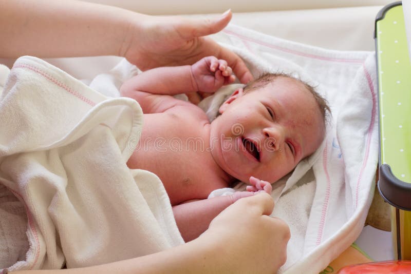 Newborn baby crying stock image