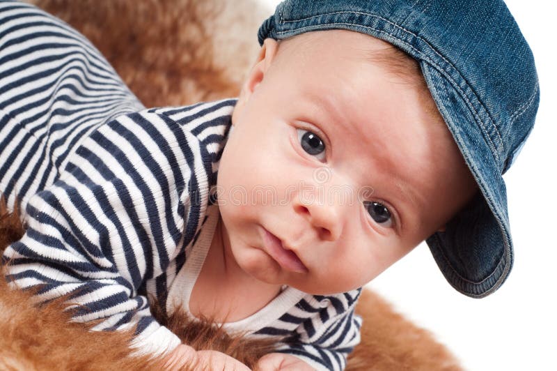 Newborn baby in denim cap stock image. Image of precious 28980413