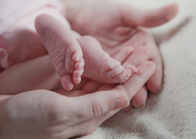 Newborn baby feet