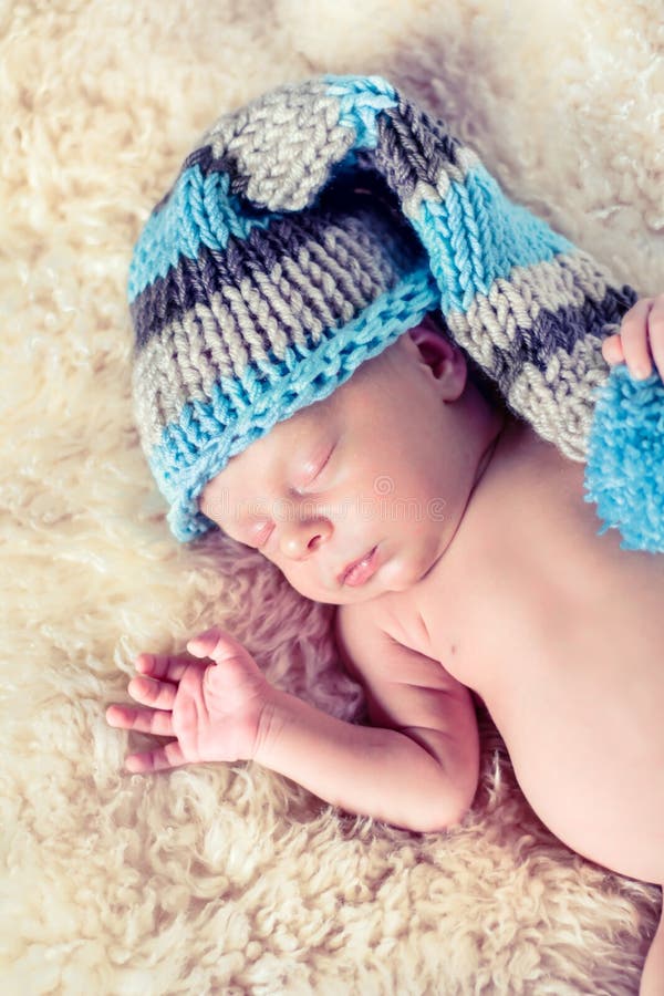 Newborn Baby in a Funny Hat. Stock Photo Image of life, indoors 78061430