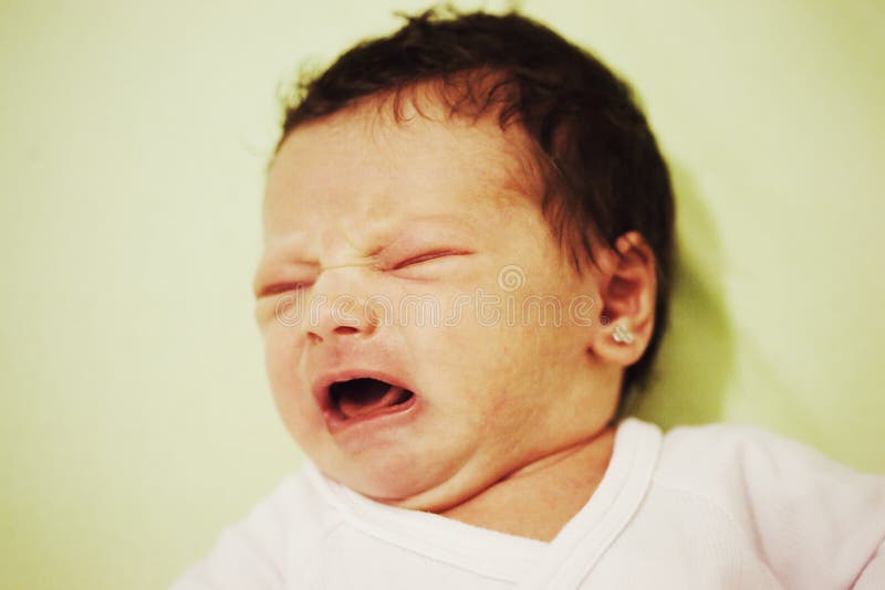 Newborn baby girl crying stock photography Newborn baby girl crying stock photography